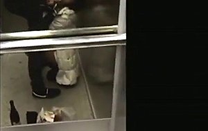 Teen sucks cock in an elevator