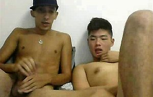 Asian twink blowing his honey friend