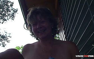 Mature shows her tits and plays with herself