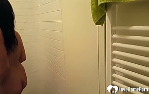 Hot stepsister teases while taking a honey shower