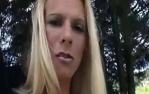 Outdoors this sweet blonde pulls on her big cock
