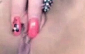 Horny chick fingering pussy