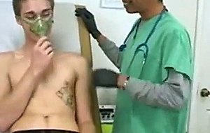 Doctor pushing fingers into ass