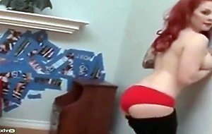 Pierced and tattooed redhead taking it doggy style