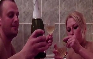 Romantic couple taking bath with wine and enjoying fuck