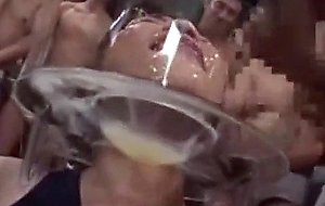 Japanese bukkake slut takes sperm bath