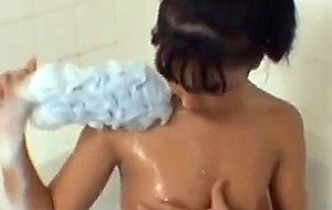 Teen taking a bubble bath