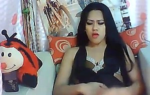 Pretty tranny jerks off and cums on her hands