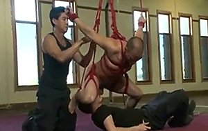 Muscled straight stud has his cock edged and suspenssed