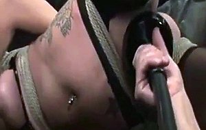 Brunette babe with big tits gets pumped during bondage