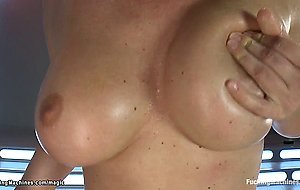 Busty oiled blond machine fucked