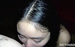 Asian babe gives a blowjob