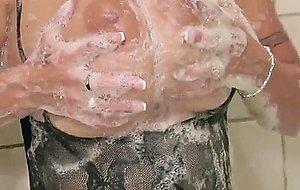 Holly halston soaping up her huge boobs in the shower