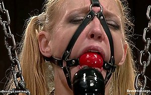 Busty MILF fingered on device bondage