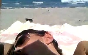 Amateur girl homemade  hot brunette rubbing and sucking at secluded beach