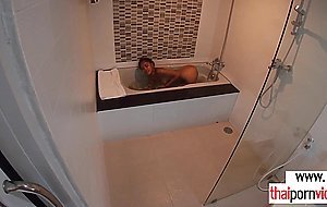 Petite amateur Thai teen Cherry fucked in the bath by a big white cock
