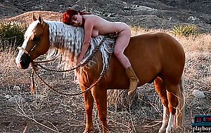 Redhead MILF babe Odette loving the outdoors and gets naked in it