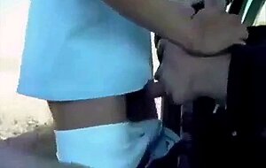 Sucking a cock seated in his car
