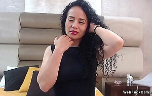 Mature amateur Latina lady masturbates on webcam