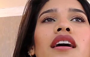 Latina beauty in socks fucks sex toy on webcam