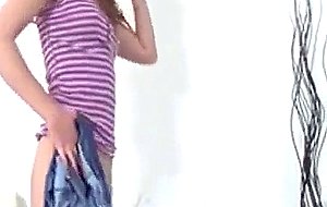 Cute teeny gets turned on pissing in her tight pants