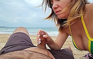 Roseshygirl, sexy babe sucking cock on a public beach and receives a mouth creampie