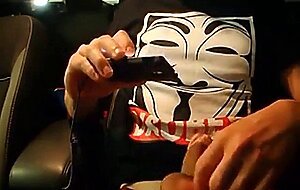 Big-Cocked Man Strokes in Car While Watching Porn