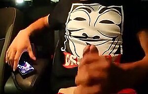 Big-Cocked Man Strokes in Car While Watching Porn