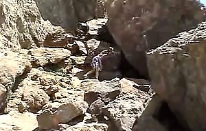 Hot teen fingers herself in outdoor scene