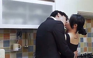 The asian stepmom has early morning sex in the kitchen