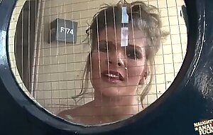 Big tits blonde is being locked in the bathroom and fucked by two huge rods