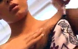 Brunette student masturbating in kitchen