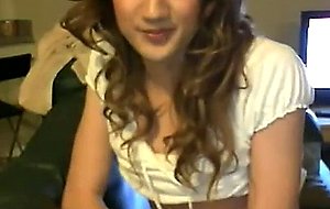 Asian teen cd shows her flat chest onthe webcam