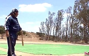 Big titty brunette teen on a baseball diamond outdoors