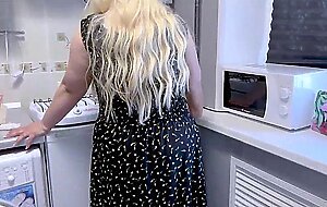 Stepson met his stepmom in the kitchen and she red a surprise for him