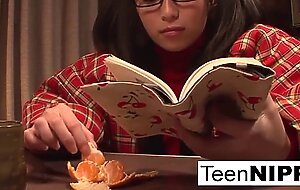 After reading a romance novel, curious teen fingers her pussy