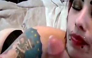 Tattooed and pierced girl giving super bj