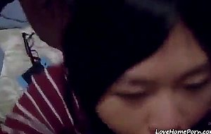 Asian girl sucks a big fat cock completely dry