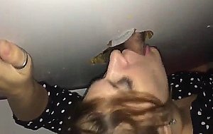 Amateur teen sucking a fat cock through a glory hole