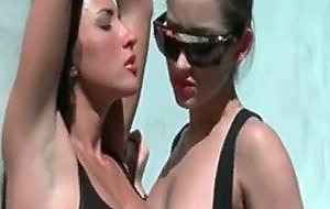 Lesbian tongue kissing in close-up with teen sex dolls
