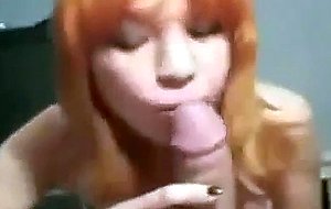 Slut with dyed hair licking and sucking a beautiful boner