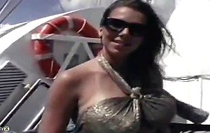 Sexy babe plays with herself on a yacht
