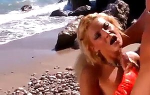 Photoshoot leads to sex on the beach