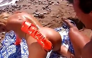 Photoshoot leads to sex on the beach
