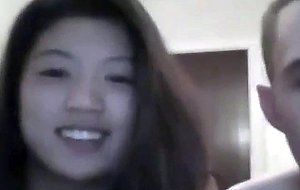 Asian girl with rose tattoo fucks and blows white boyfriend