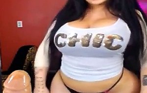 Gorgeous brunette sucking rubber cock on webcam