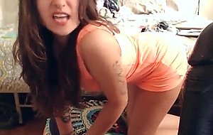 Orange dress makes her booty look wow