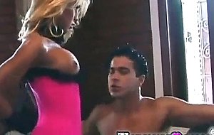 Pink outfit on a blonde tranny sucking a good dick