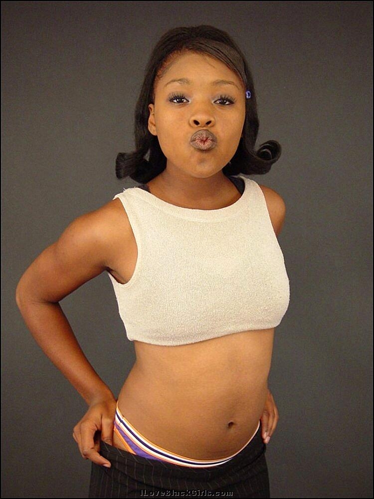 Sweet ebony teen plays with her pussy after stripping naked