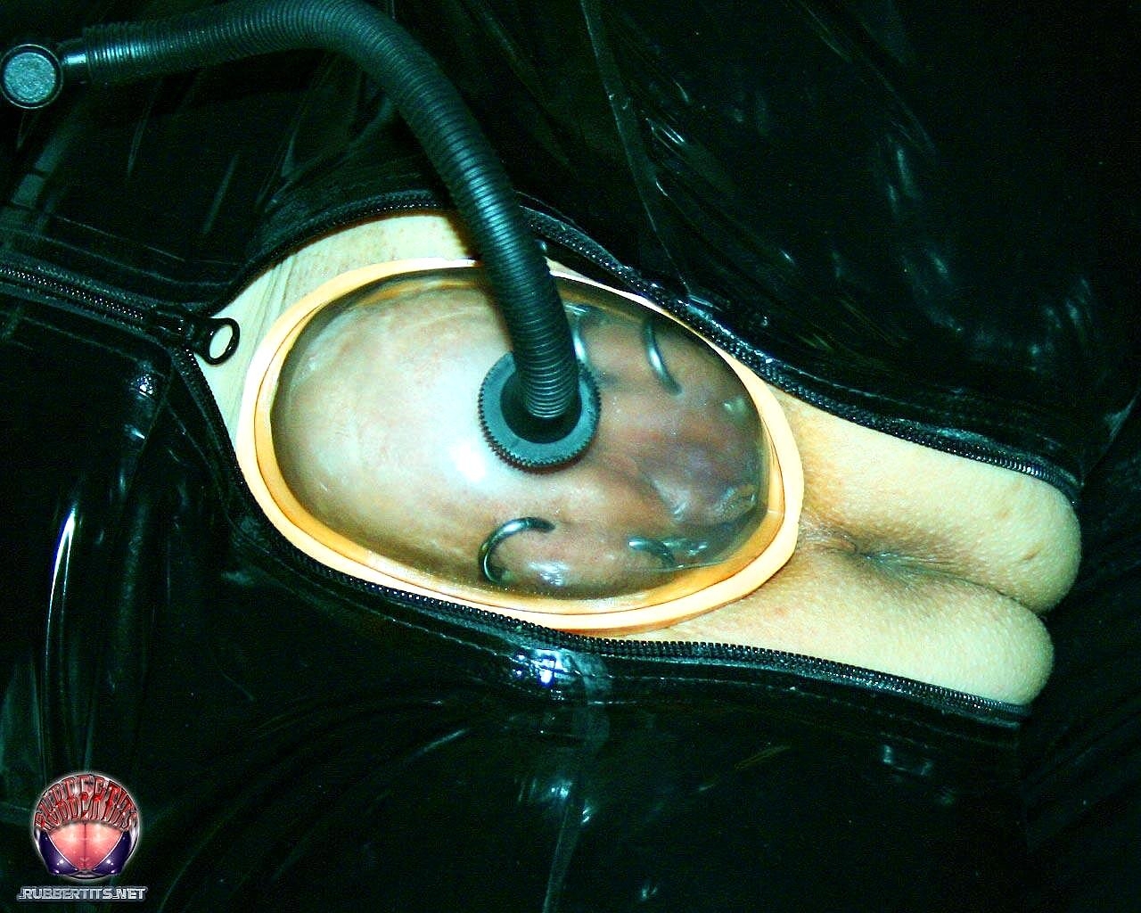 Latex Clad Chick With Pierced Nipples Pumps Up Her Pierced Pussy In Boots Big-Tits, Boots, Fetish, Latex, Piercing